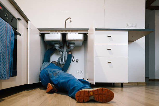 Professional Drain Cleaning technician working in Isom, KY